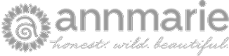 Annmarie brand logo with slogan and floral design.